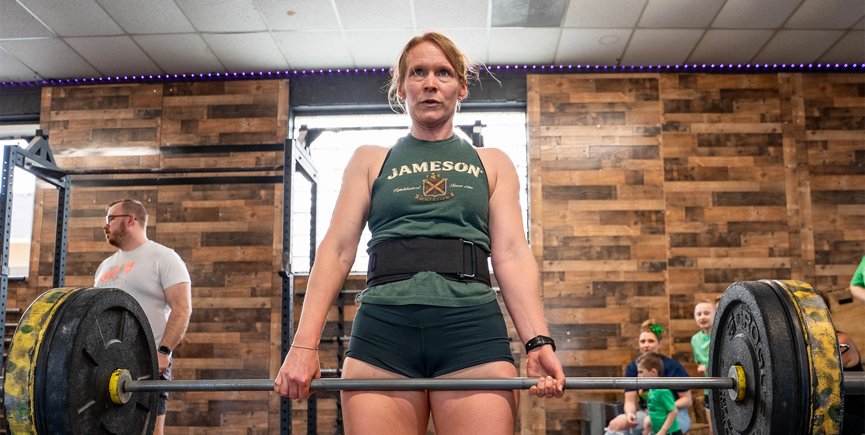 woman lifting heavy at Hive Strength Co woman lifting heavy at Hive Strength Co